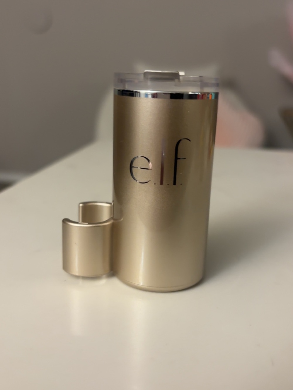 Elf tumbler lip oil holder